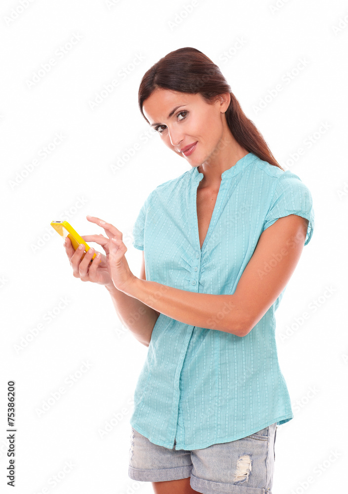 Beautiful lady texting message on mobile phone Beautiful lady texting message on mobile phone