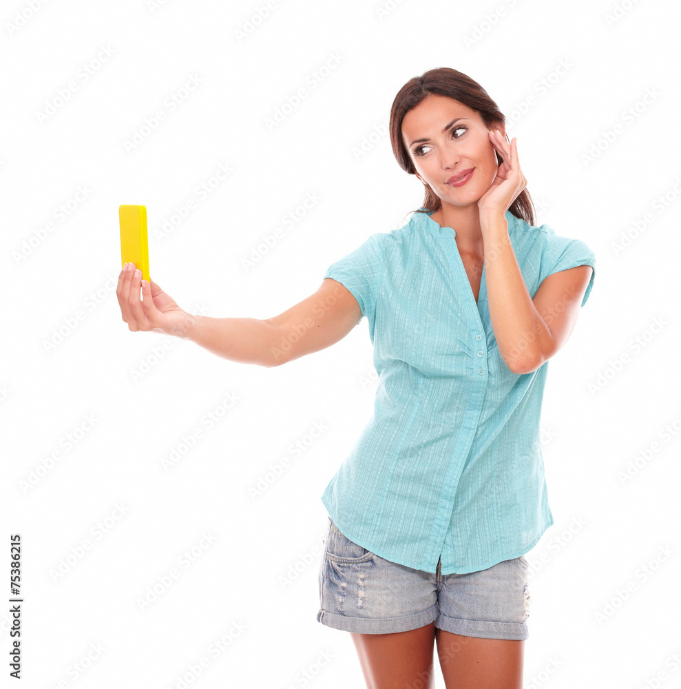 Attractive female taking photos of herself Attractive female taking photos of herself