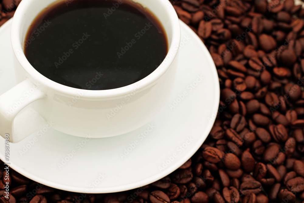 Cup And Saucer On Coffee Beans Cup And Saucer On Coffee Beans