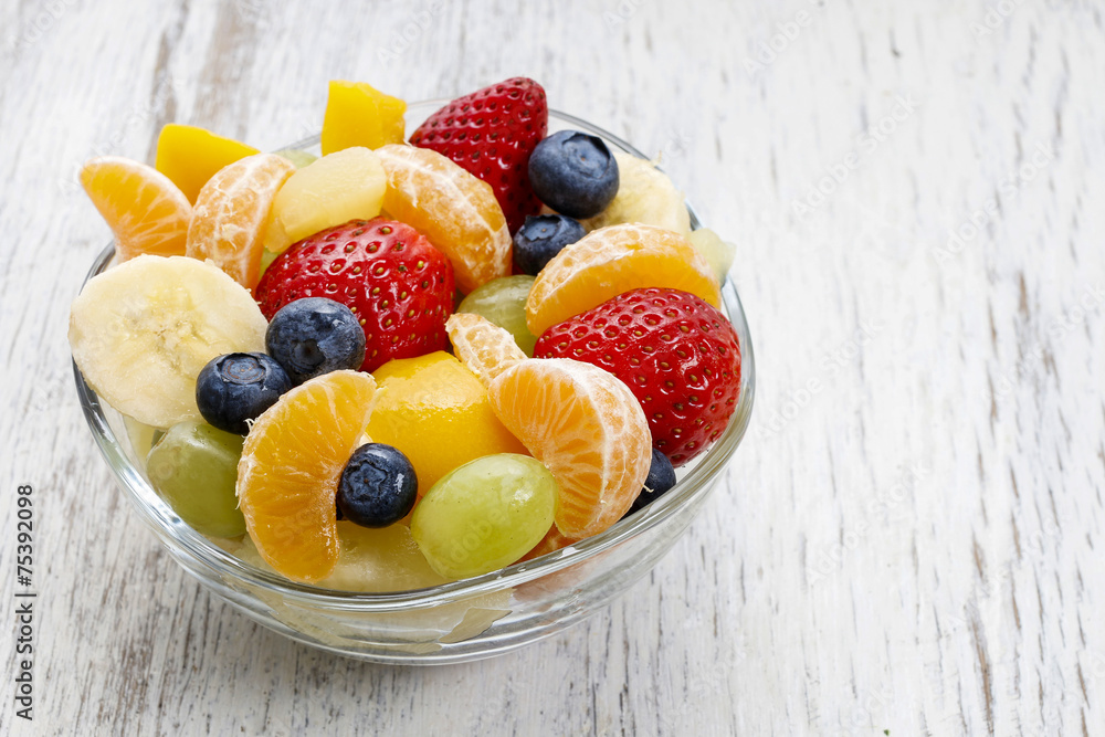 Fruit salad in glass bowl Fruit salad in glass bowl