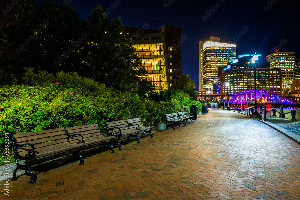 Benches along the Harborwalk at night in Boston, Massachusetts.