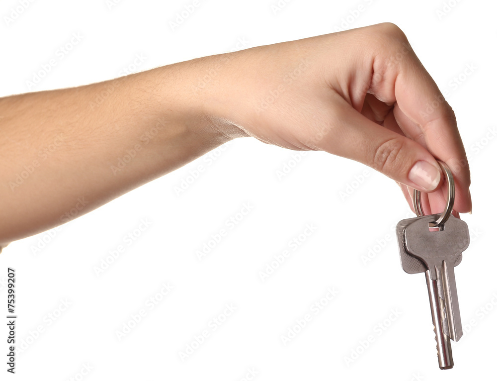 Keys in hand isolated on white