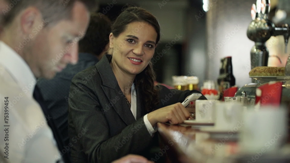 Portrait of happy, successful businesswoman, sitting by counter Portrait of happy, successful businesswoman, sitting by counter