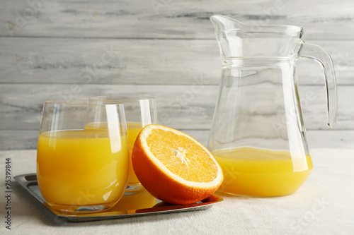 Glass of orange juice with slices