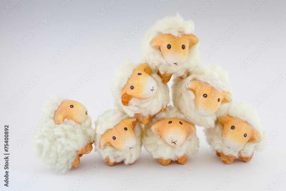 Naklejka premium Eight cute sheep playing together