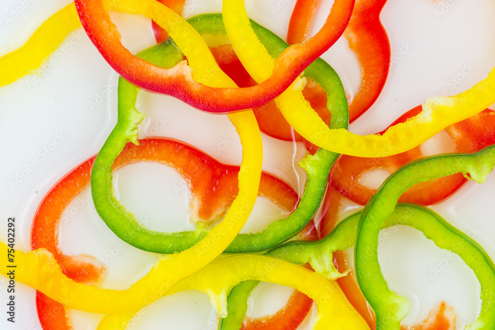 Arrangement of sliced bell peppers on white background Arrangement of sliced bell peppers on white background