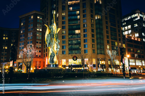 Traffic circle and modern buildings at night in Baltimore, Maryl