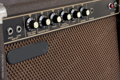Close up of brown electric guitar amplifier