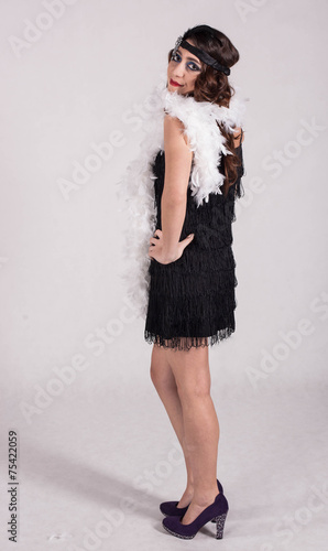 Photography Young sexy girl posing in flapper style dress