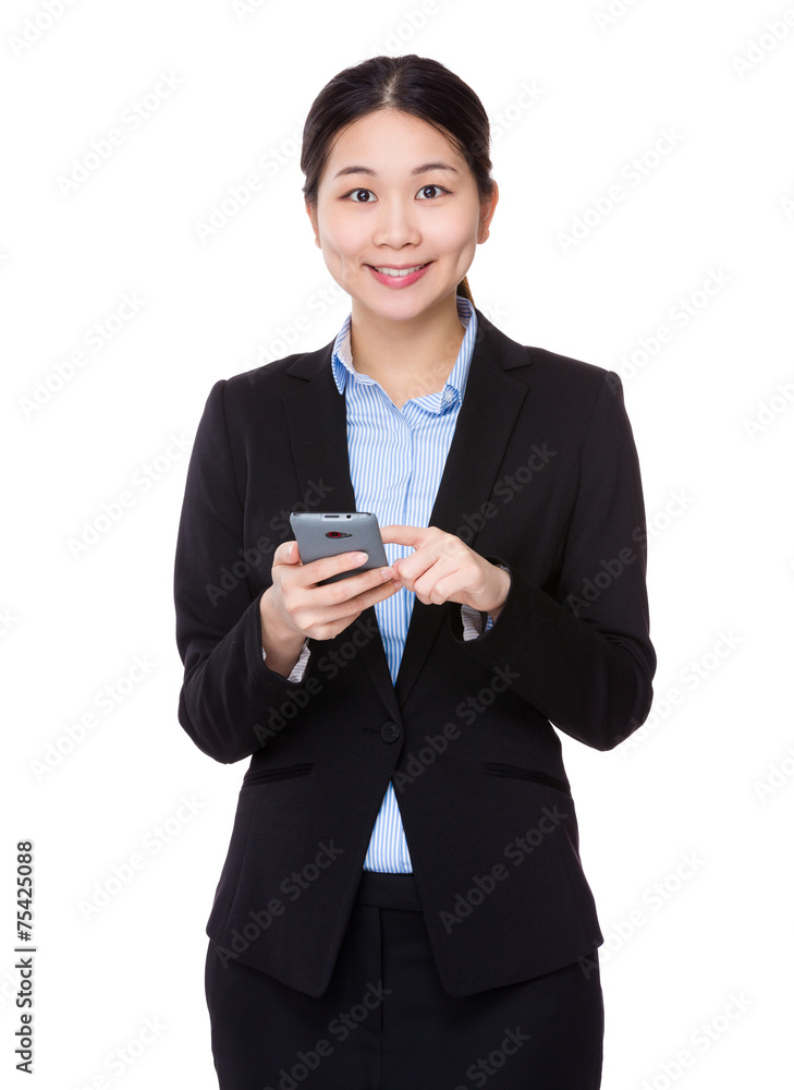 Businesswoman use of cell phone Businesswoman use of cell phone