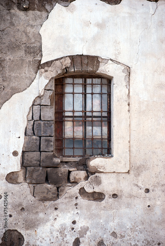 Ruin window with iron bars