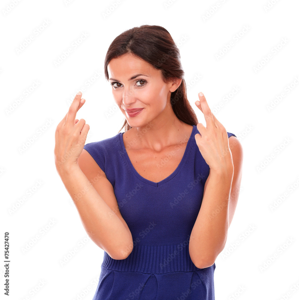 Cute latin woman making a wish and luck sign Cute latin woman making a wish and luck sign