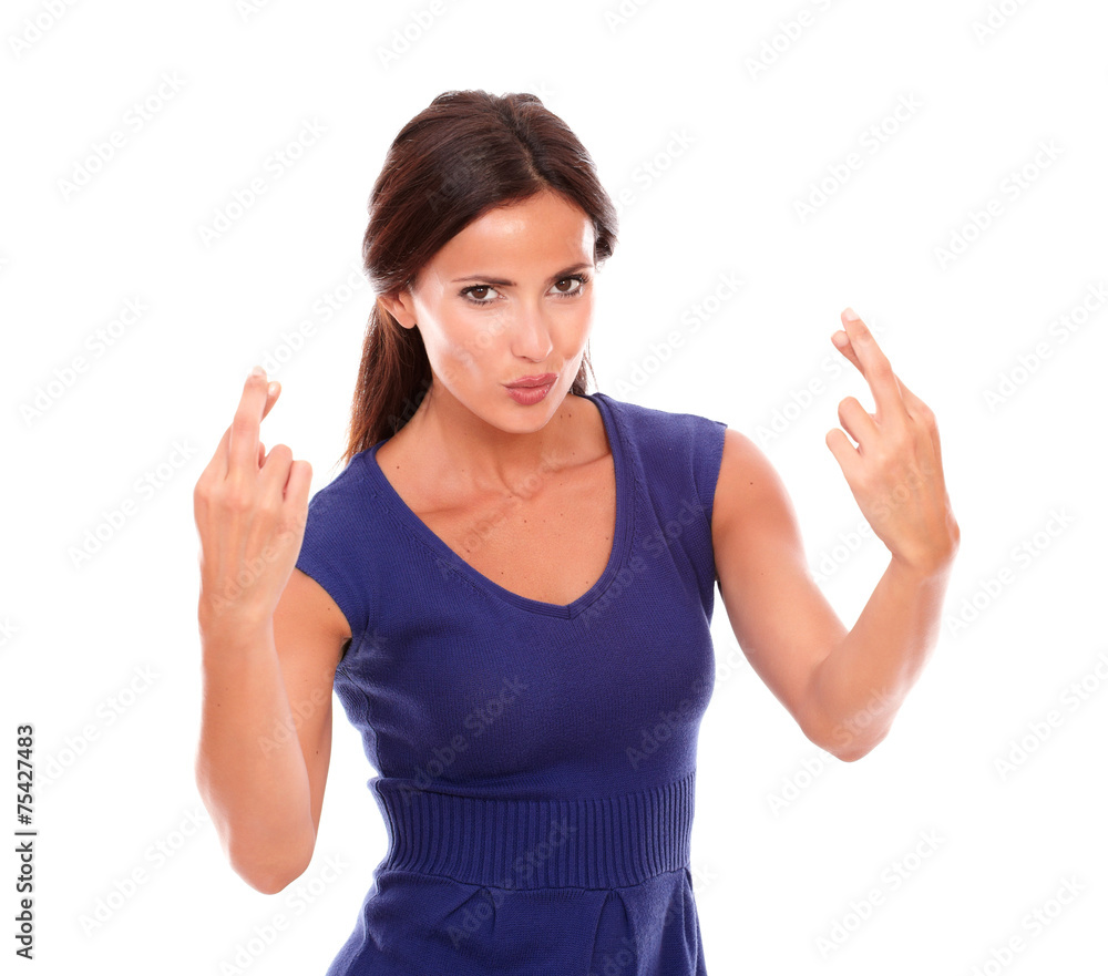 Attractive female making a wish and luck sign Attractive female making a wish and luck sign