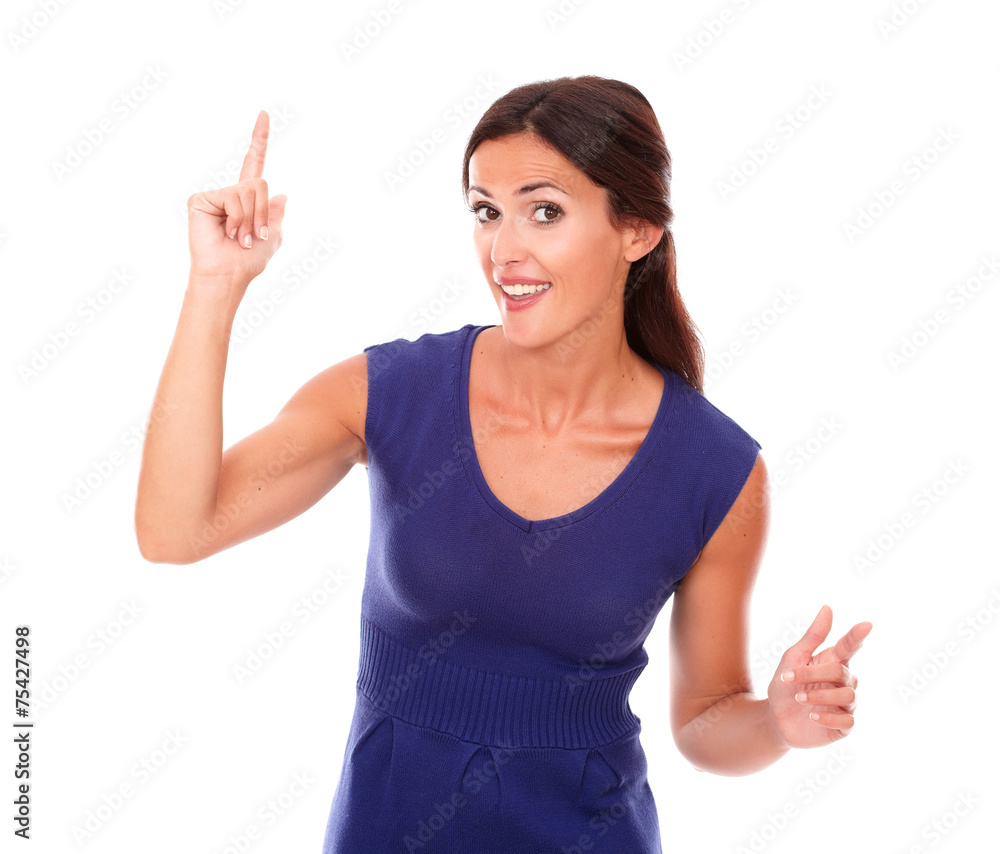 Beautiful girl with finger pointing up Beautiful girl with finger pointing up