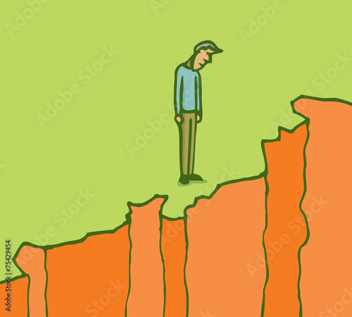Man standing on the edge of a cliff