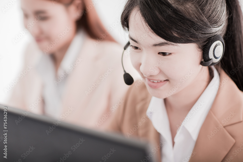 Asian women call center with phone headset Asian women call center with phone headset
