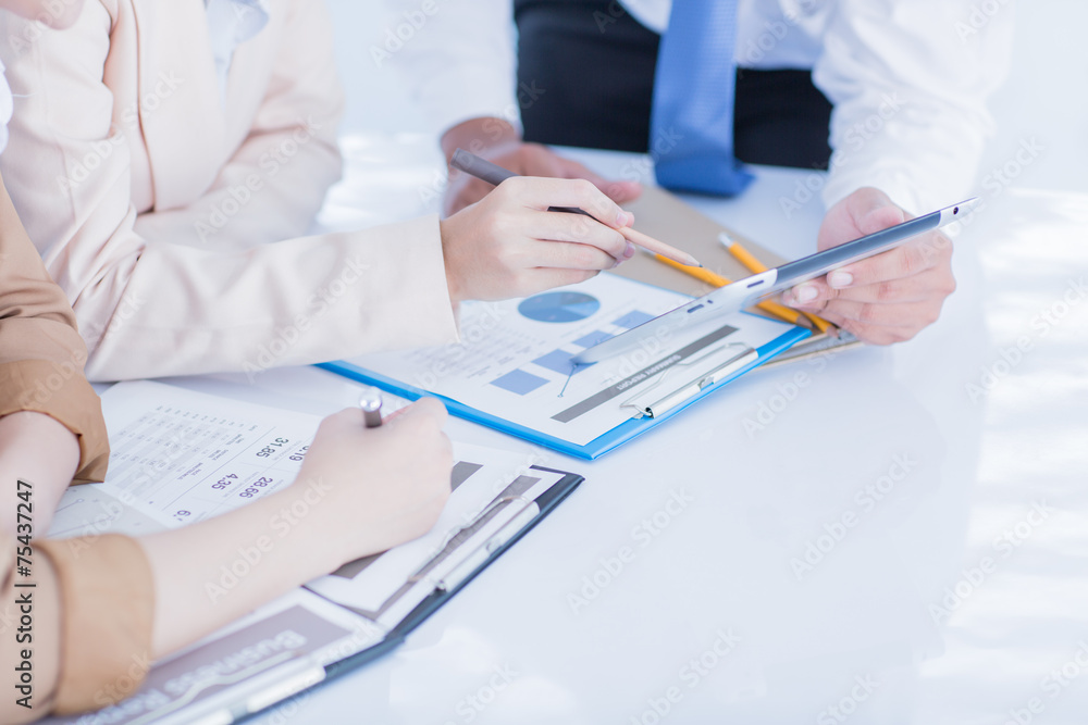 Business people discussing the charts and graphs showing the res