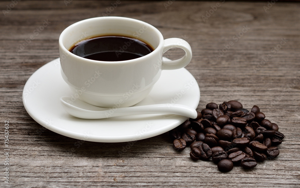 Coffee cup on a wooden table. Coffee cup on a wooden table.