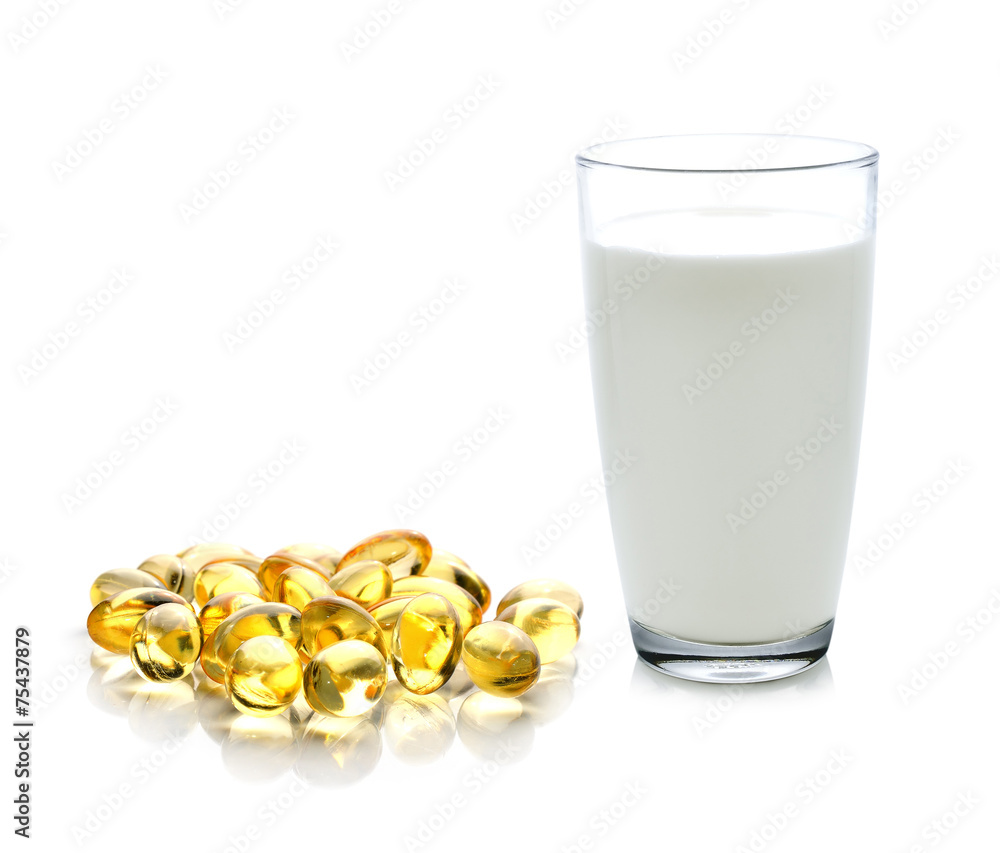 glass of milk and fish oil isolated on white background glass of milk and fish oil isolated on white background