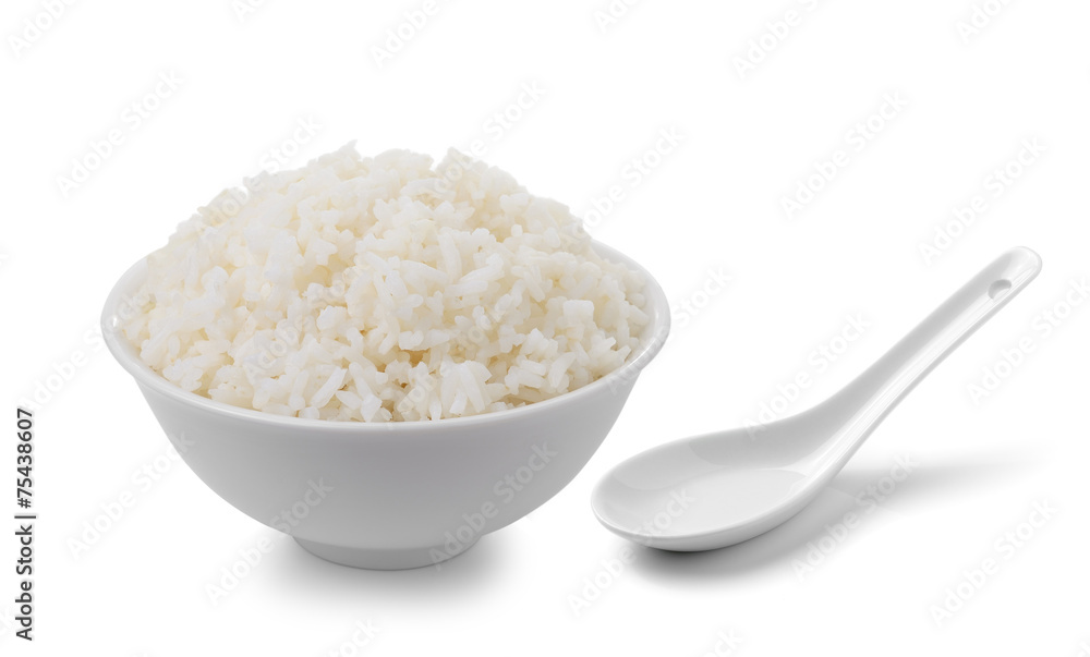 bowl full of rice and spoon on white background bowl full of rice and spoon on white background