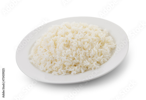 Cooked rice in a white plate on white background