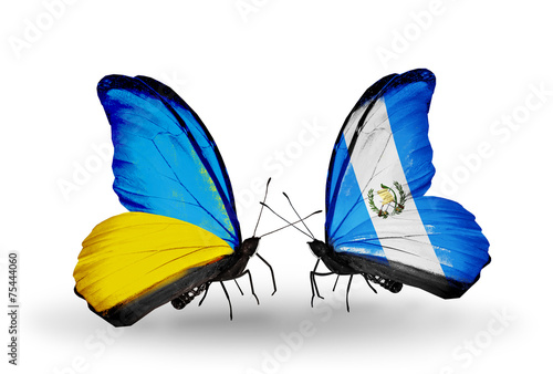 Two butterflies with flags Ukraine and Guatemala