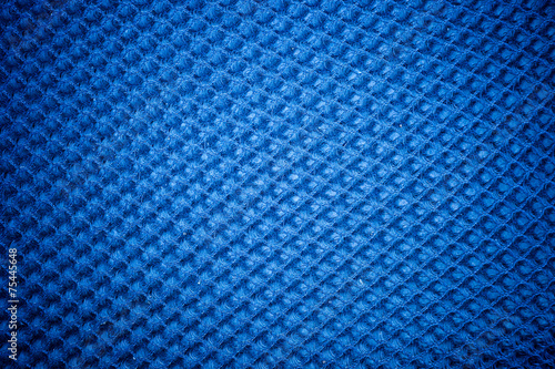 A vintage cloth cover with a blue screen pattern and grunge back
