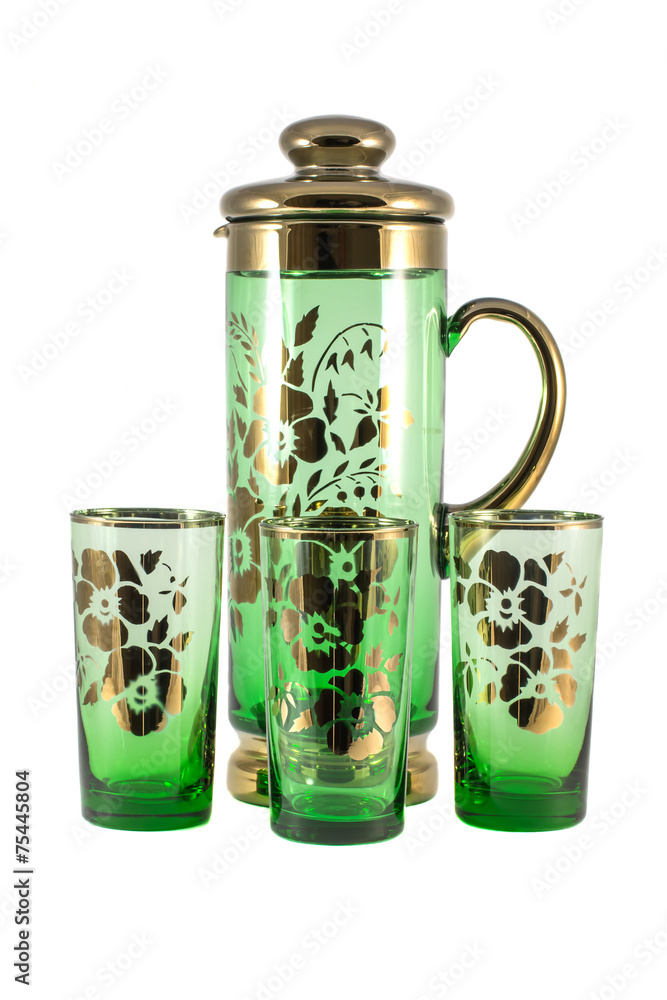 Obraz premium Glass service on a white background with flowers
