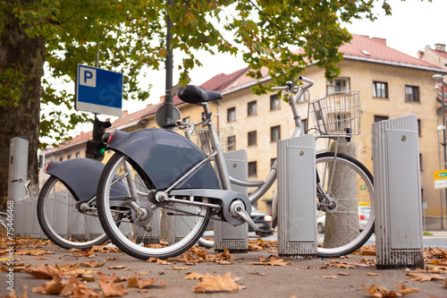 Station of urban bicycles for rent photo