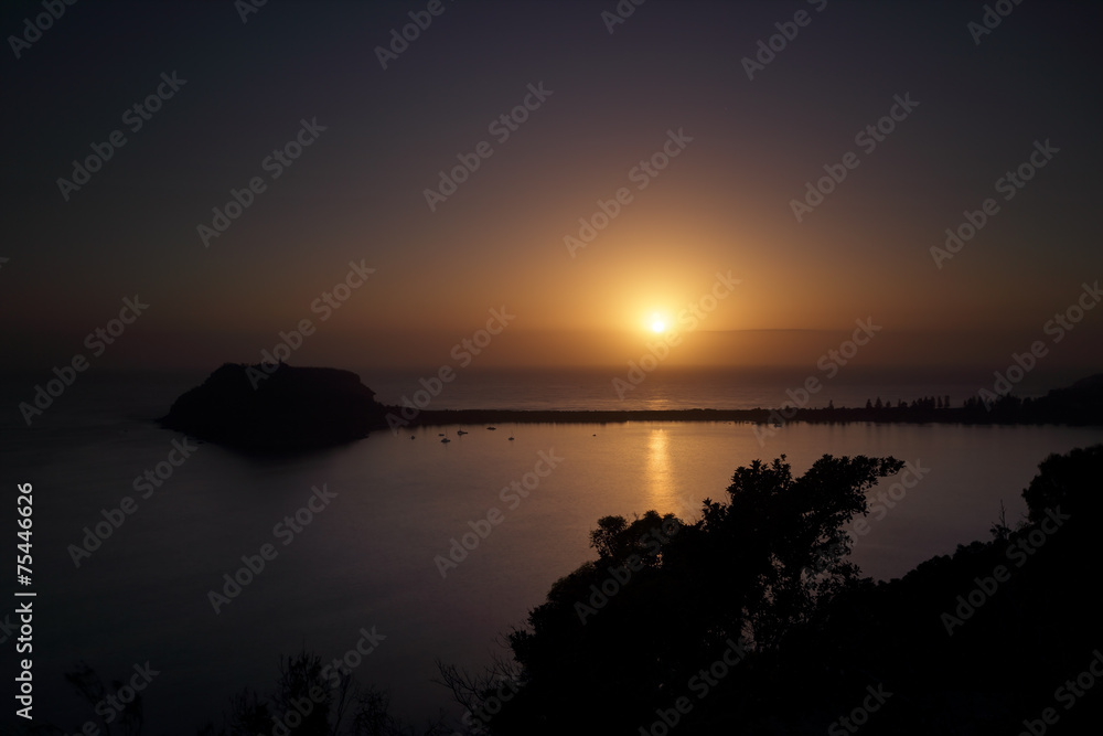 Tranquil sunrise and silhouettes over Pittwater, Broken Bay, Pal