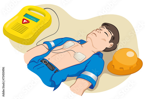 first aid employee with portable defibrillator