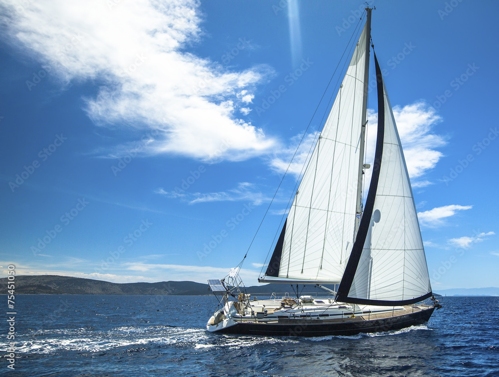 Sailing in the wind through the waves. Sailing. Luxury yachts.