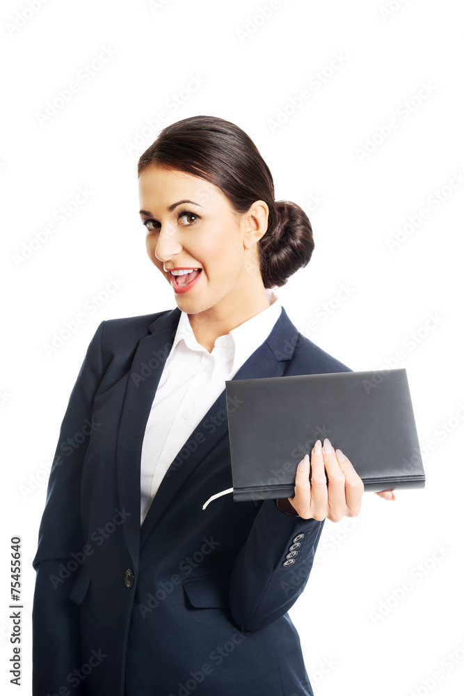 Portrait of businesswoman holding her notes Portrait of businesswoman holding her notes