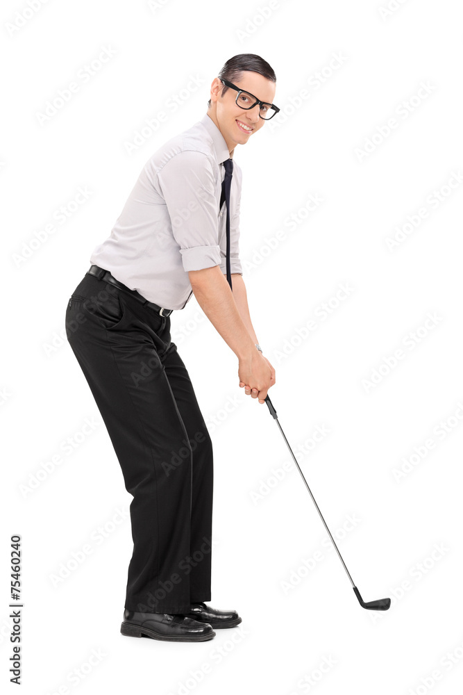 Full length portrait of a man playing golf Full length portrait of a man playing golf