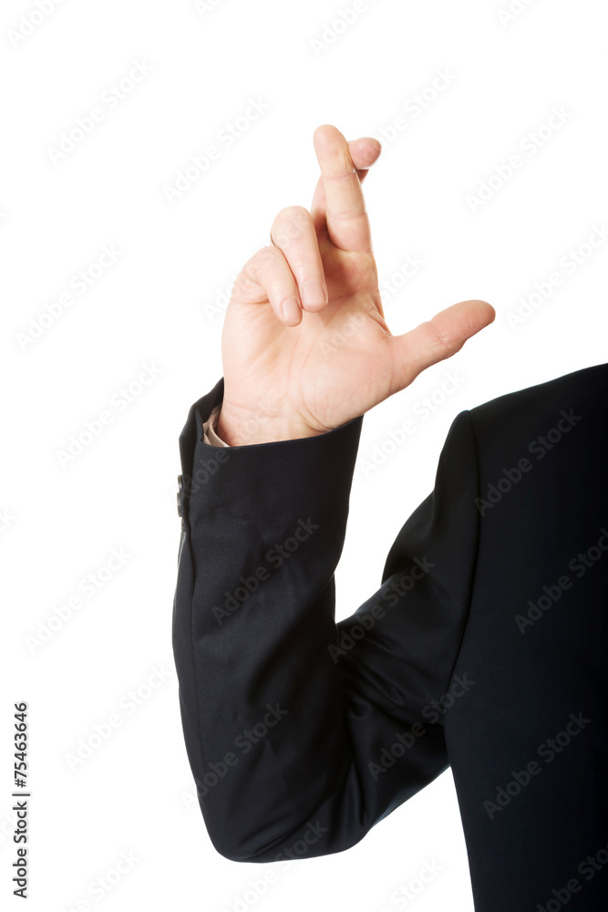 Close up on male hand with fingers crossed Close up on male hand with fingers crossed