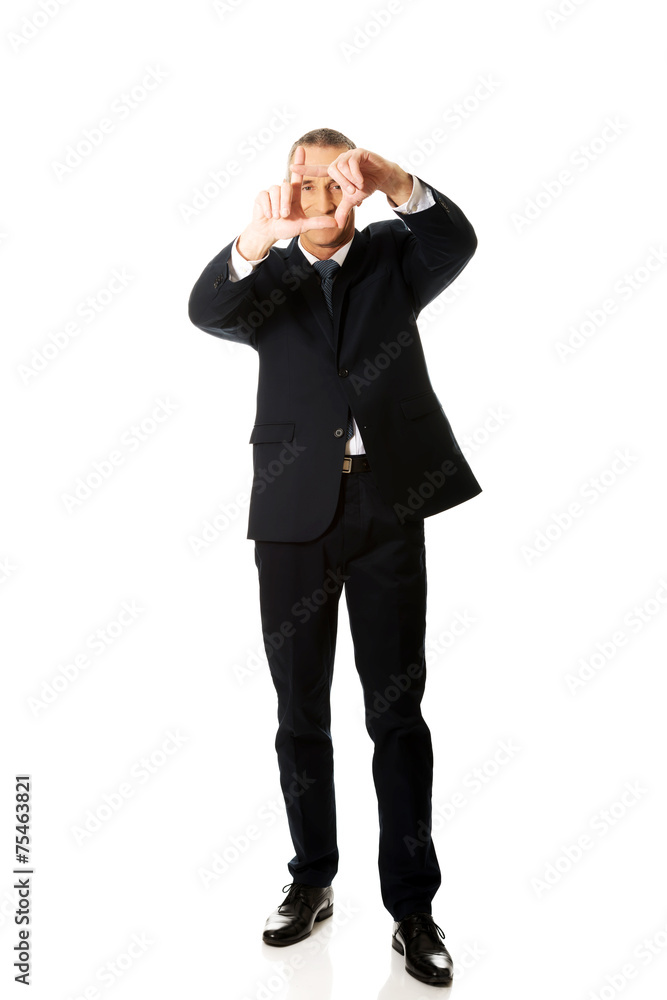 Full length businessman gesturing frame Full length businessman gesturing frame