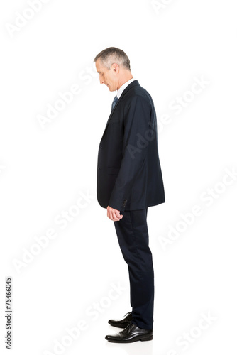 Full length side view businessman standing