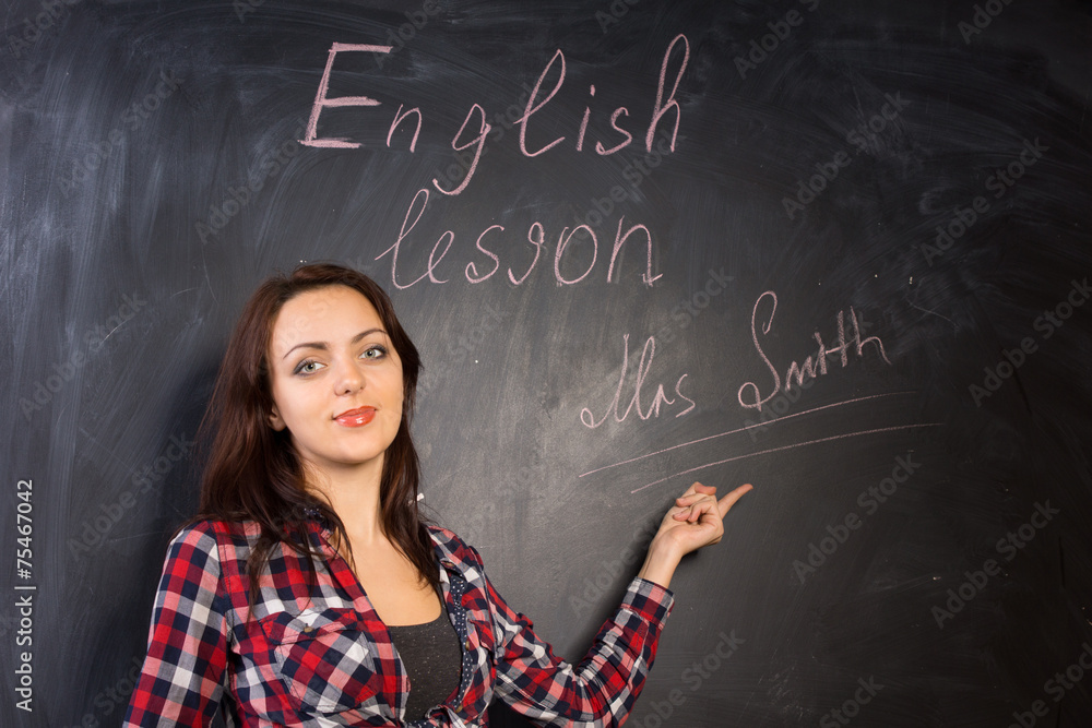 Young teacher introducing herself to the class