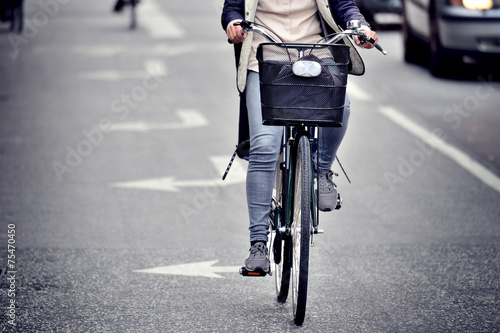 Photography Female bicyclist on the street