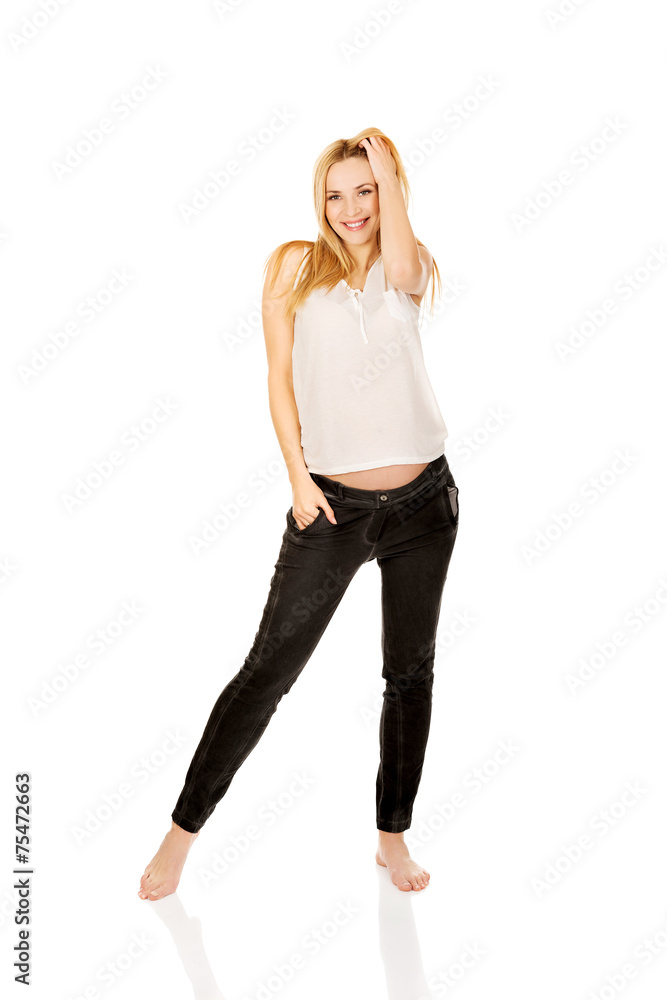 Happy pregnant woman looking at camera Happy pregnant woman looking at camera
