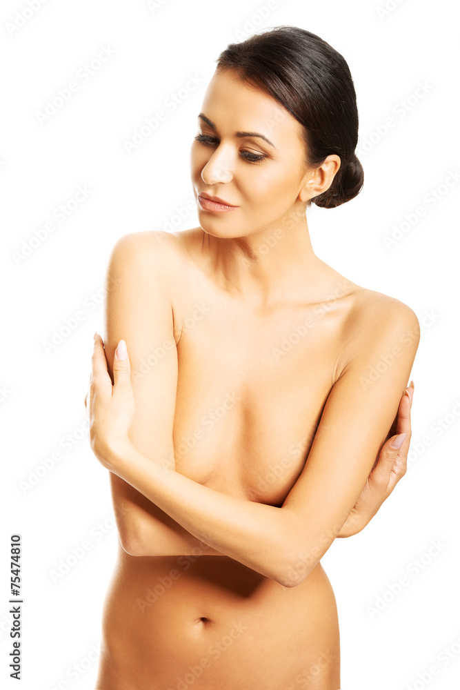 Portrait of nude woman covering her breast Portrait of nude woman covering her breast