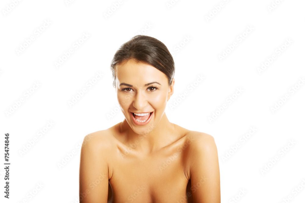 Portrait of nude woman laughing loud, looking at the camera Portrait of nude woman laughing loud, looking at the camera