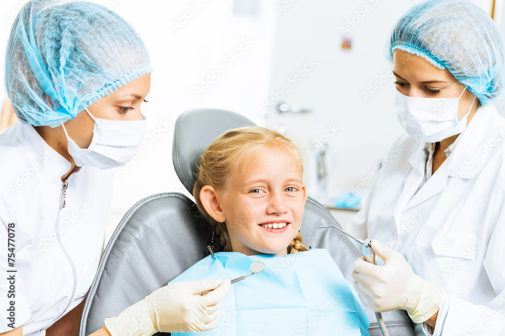 Dentist inspecting patient Dentist inspecting patient