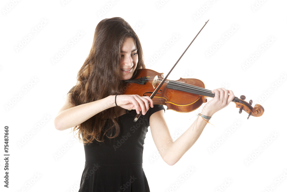 teenage girl plays violin in studio