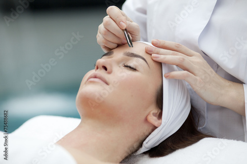 Woman receiving spa treatment 