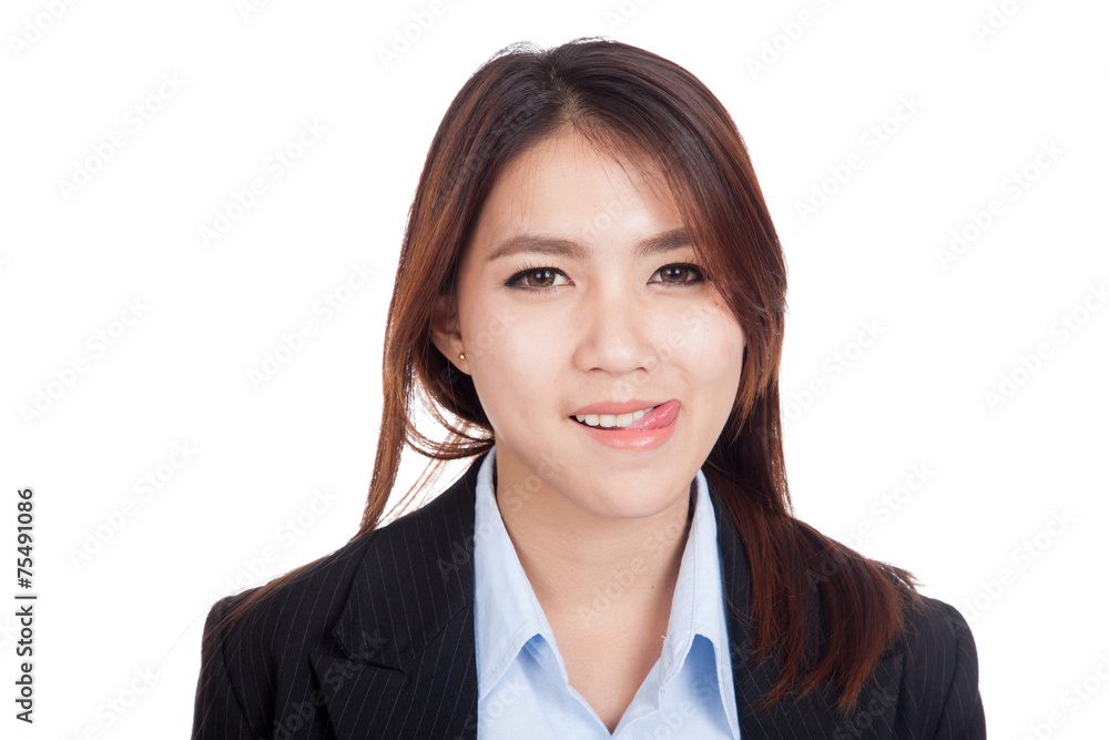 Young Asian businesswoman smile with her tongue out Young Asian businesswoman smile with her tongue out