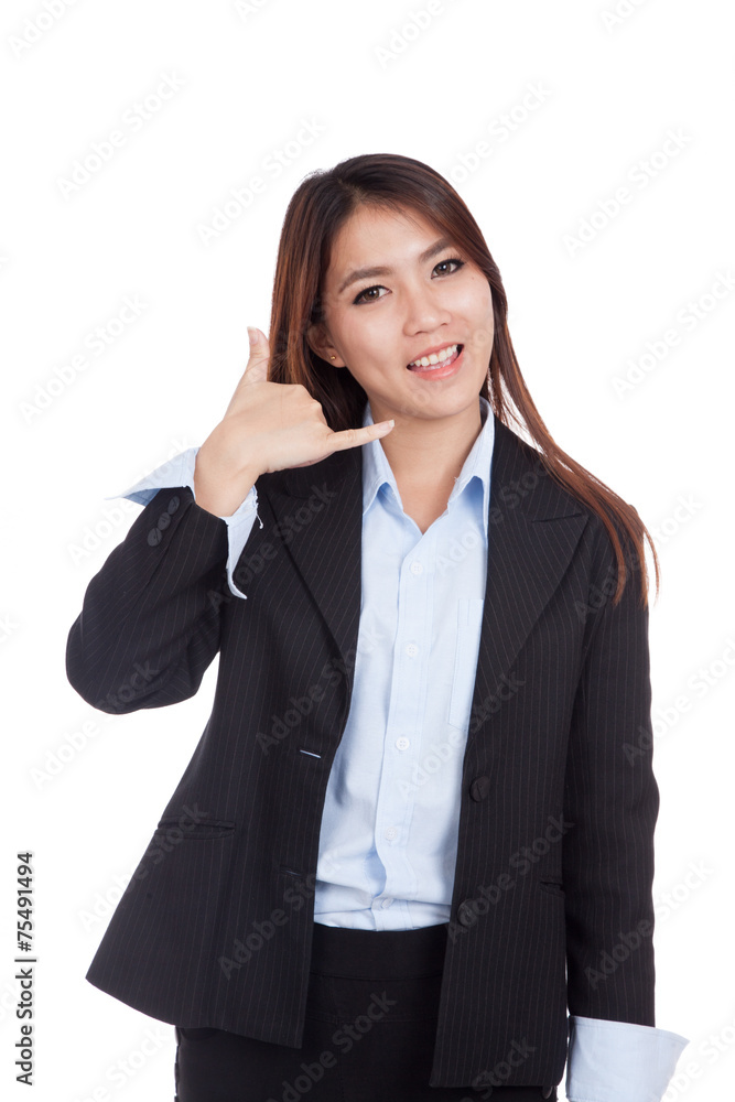 Young Asian businesswoman gesturing phone call Young Asian businesswoman gesturing phone call