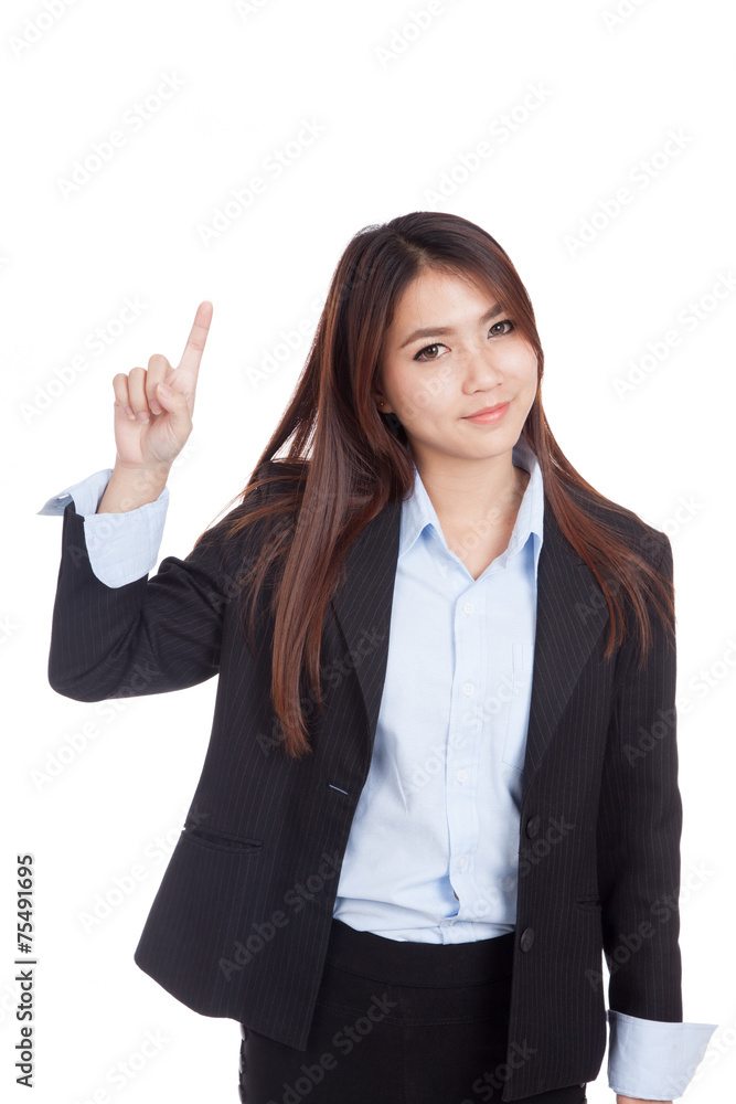 Young Asian businesswoman point up and smile Young Asian businesswoman point up and smile