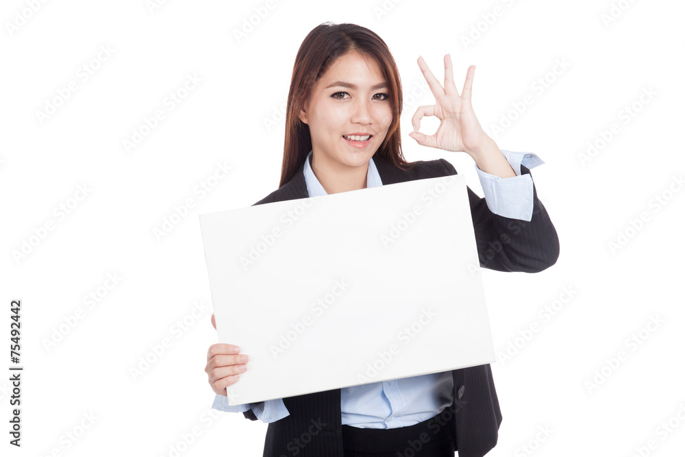 Young Asian businesswoman show OK with blank sign Young Asian businesswoman show OK with blank sign