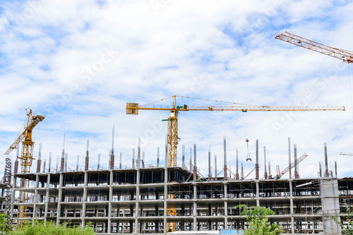 Crane and building construction site © 632imagine